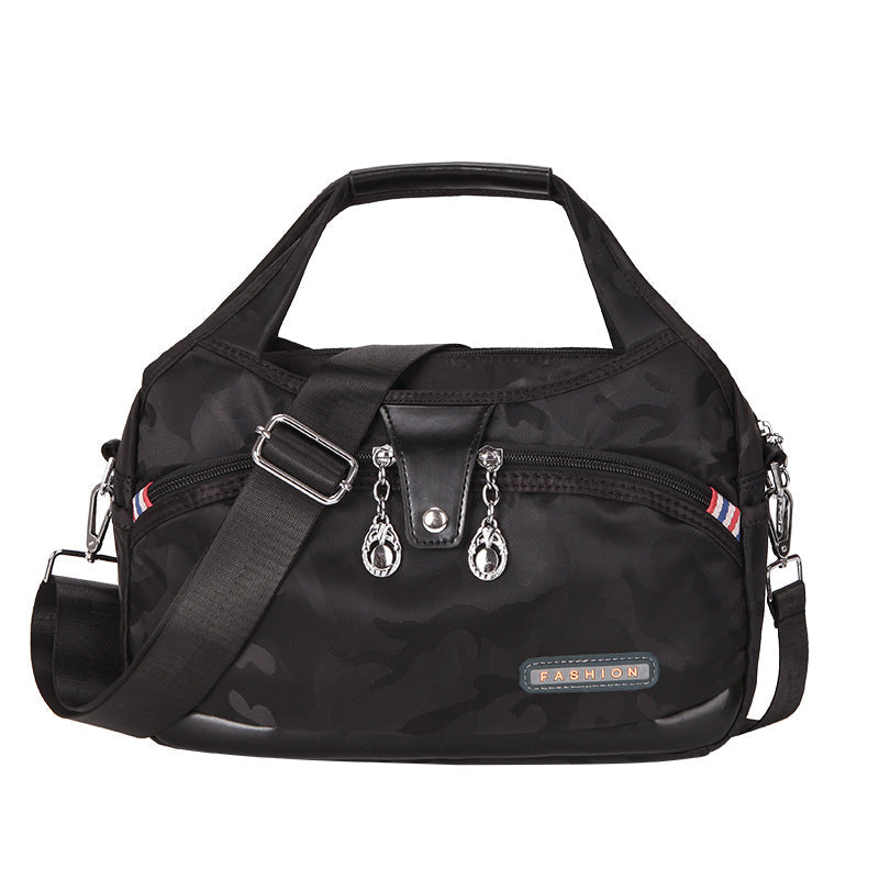 Muodikas varkaudenestoinen olkalaukku