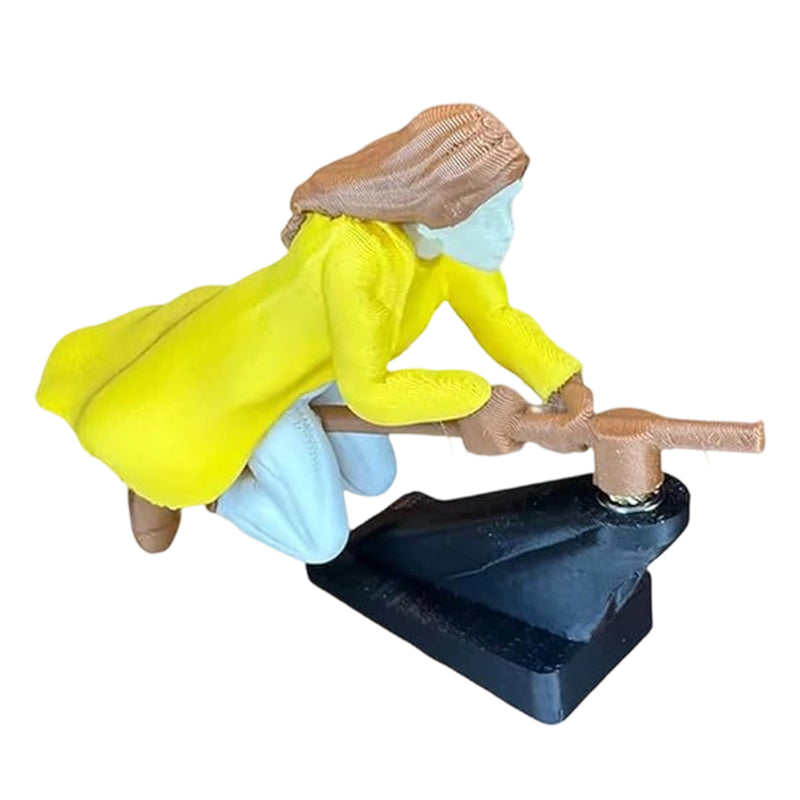 Maaginen luudanvarsikoriste auton kojelaudalle