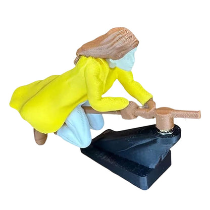 Maaginen luudanvarsikoriste auton kojelaudalle