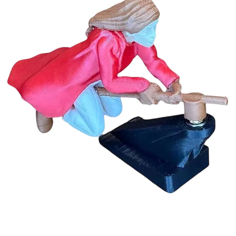 Maaginen luudanvarsikoriste auton kojelaudalle